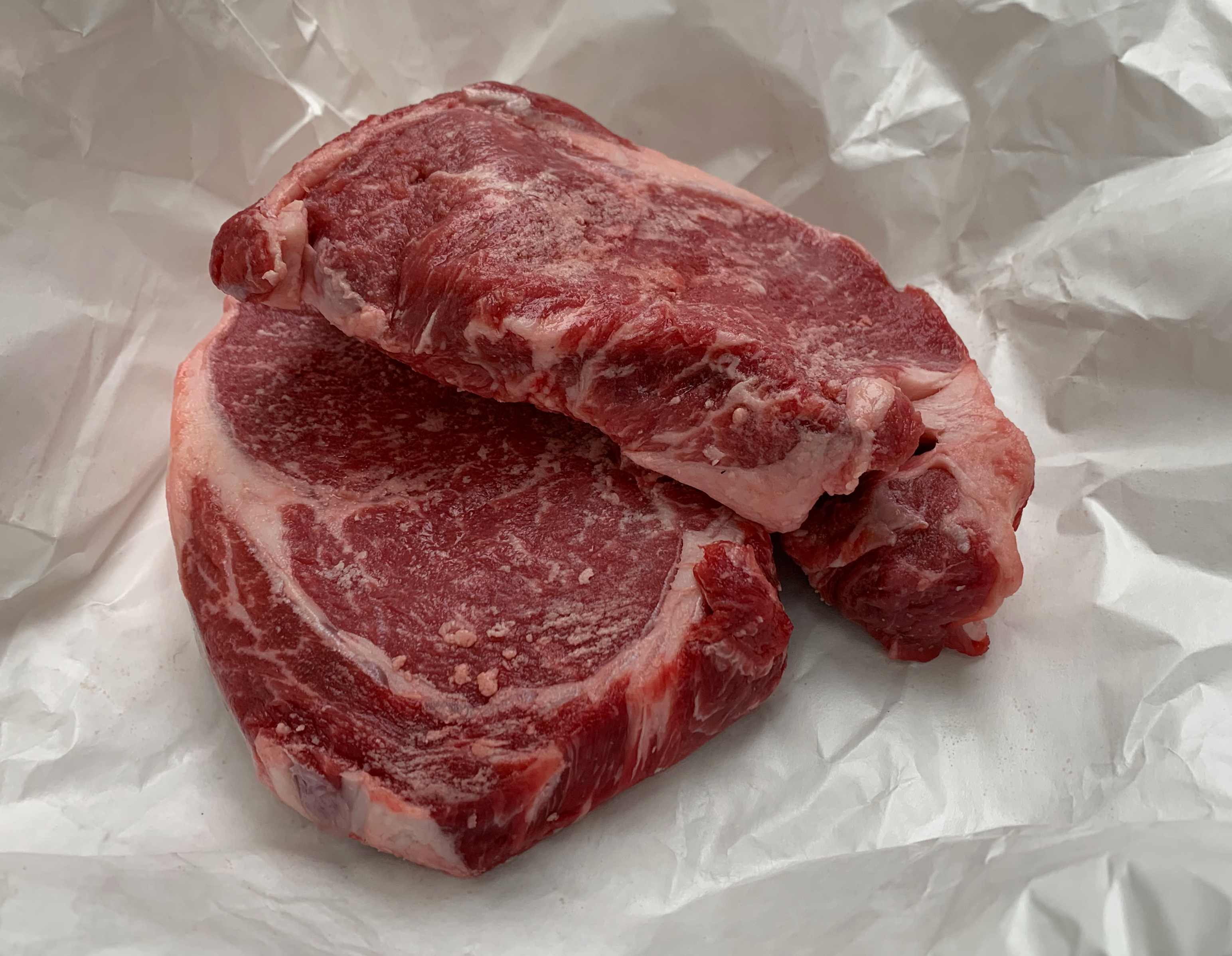 Delmonico (Ribeye) Steaks, Dry Aged Charolais, 2 to a Pack, 1.85 - 2.50 lbs. Weight Range. Flash Frozen.