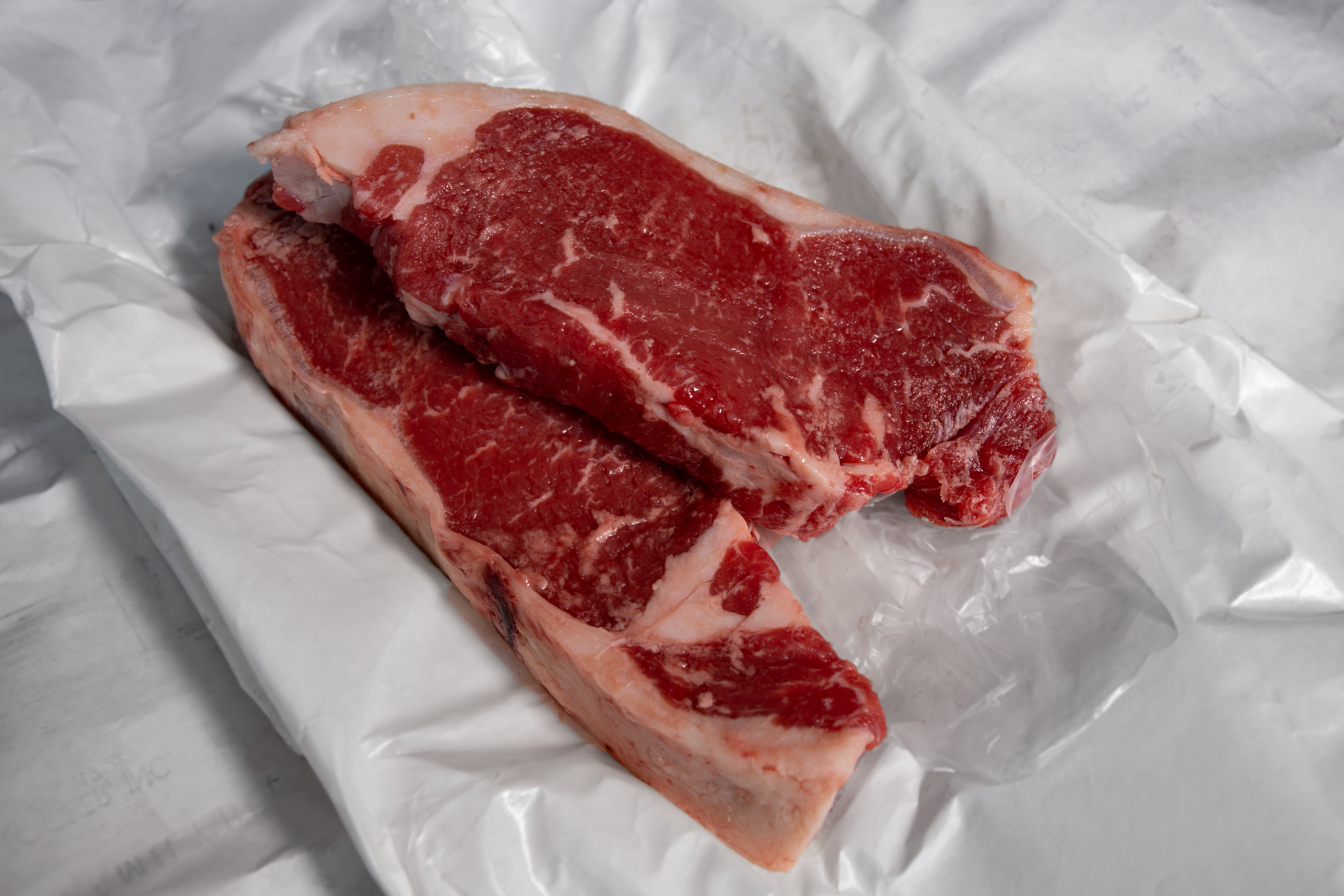 New York Strip, Dry Aged Charolais, 2 Per Package. 1" Thick. Flash Frozen.